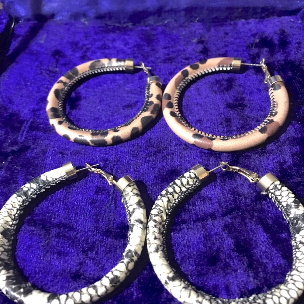 Two pairs of Leather animal print hoop earrings